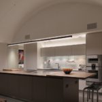 contemporary kitchens with sleek lines and barrel vaulted ceiling